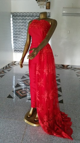 A jumpsuit with a detachable train