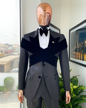 An “octopus” black inverted square patterned metallic jacquard tuxedo suit
