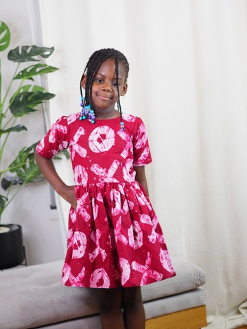 Nyota dress in wax fabric for little girl