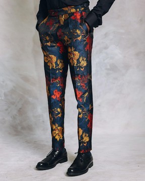 A splashed red, yellow &amp; blue floral jacquard Gurkha pant with side metal adjuster