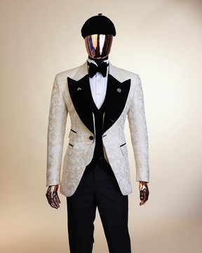An Ivory white &amp; Gold Floral patterned Peak lapel metallic jacquard tuxedo suit