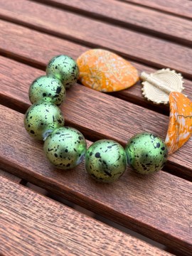 Green and orange ethnic bracelet
