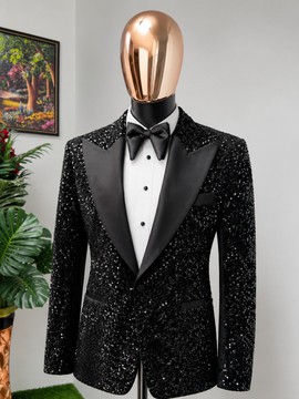 A black velvet silver doted tuxedo suit. Best seller