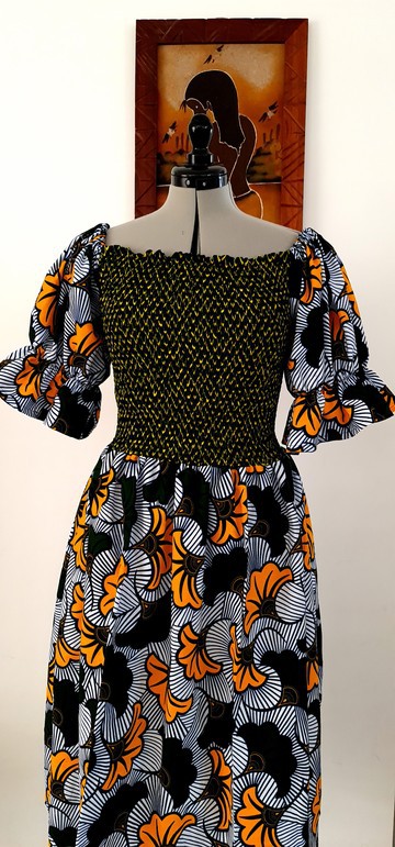 Mid-length off-the-shoulder dress.