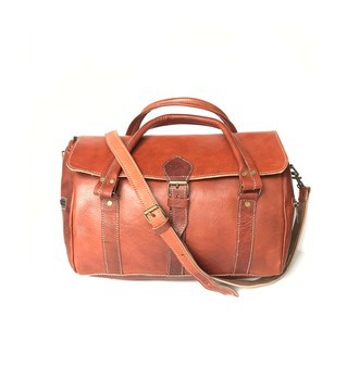 real travel bag in genuine brown leather