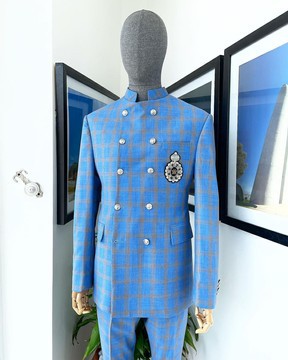 An Azure blue &amp; apricot orange glen check “preacher” double breasted safari suit
