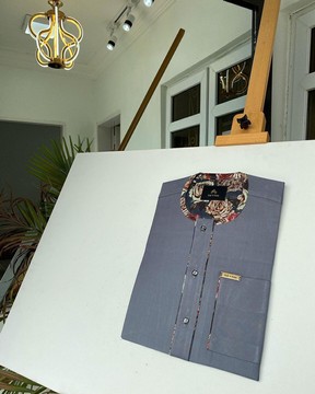 A Bright Grey Kaftan.
