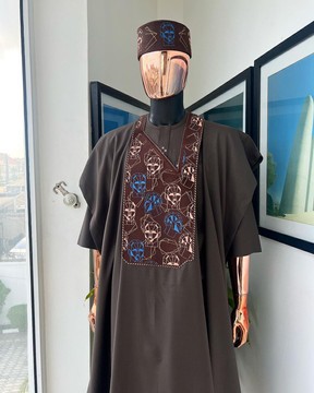 An Umber Brown, AI connected iron-man maze embroidery details agbada