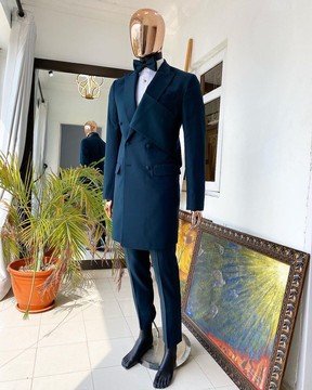 An Emerald green “Oranmiyan” trench blazer suit