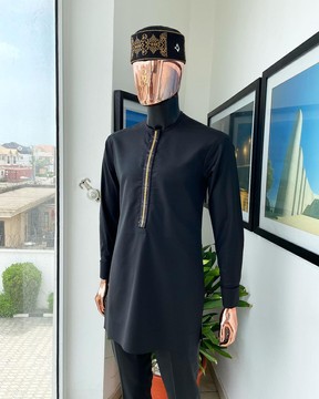 A charcoal black, starkled connected rectangle embroidery detailing African traditional kaftan