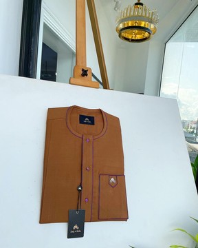 A Tawny brown, front flap, patch pocket, matching Swarovski buttons, paisley detailing kaftan
