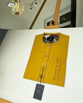 A Mustard Yellow Men’s tailored kaftan with interlocking lane design