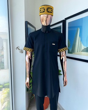 A charcoal black, connected star gold embroidery detailing senator kaftan native.