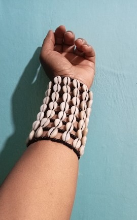 African jewellery, cowrie shell bracelets, beads bracelets.