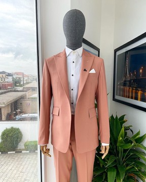 A mauve peak lapel one button suit &amp; pant trousers.