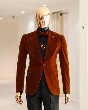 A syrup brown, peak lapel tuxedo suit