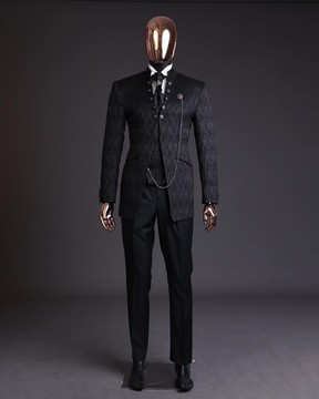 The “Ever After” charcoal black, half front cut, rectangle pattern metallic jacquard tuxedo suit