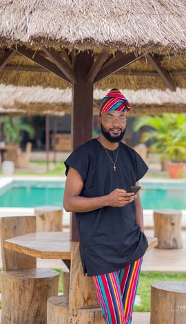 Classic Black Tunic with Vibrant Striped Trousers &amp; Matching Cap