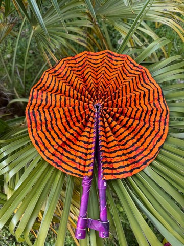 Wax and leather fan in its pouch