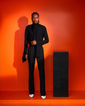 A Black, Covered Neck Shirt.