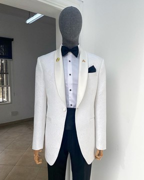 A “Classic” ivory floral jacquard shawl lapel blazer suit.