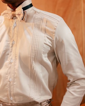 A Silk, brown dessert sand pleated tuxedo shirt.