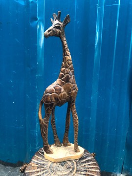 Wooden giraffe home decor curving