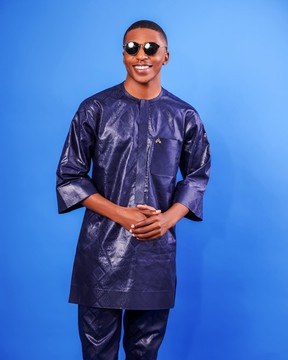 A midnight blue, front flap, 3/4 sleeve African senator kaftan native.