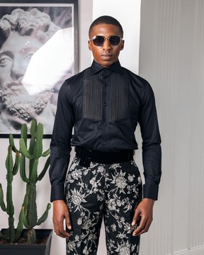 A black, cut-away collar, pleated evening tuxedo shirt.