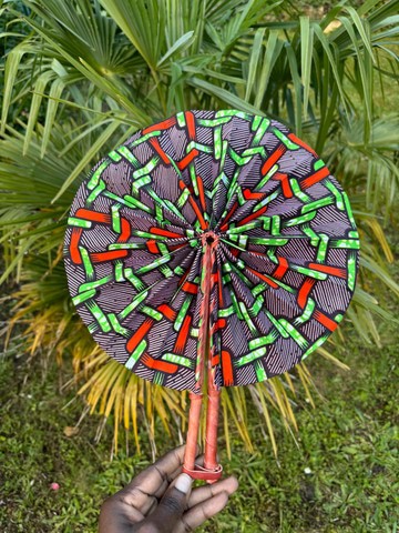 Wax and leather fan in its pouch