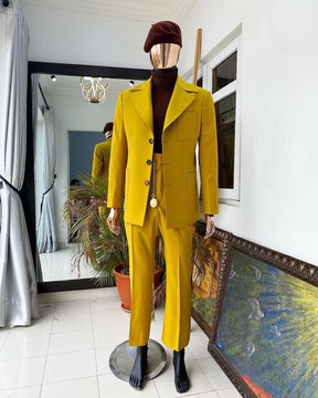 The reloaded “ Festac 77” mustard yellow 3 button safari suit