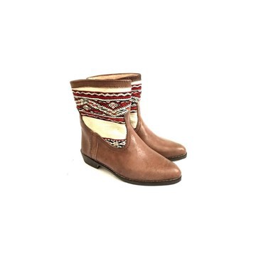 High-end handmade genuine leather and kilim boot.