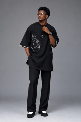 Men’s Black Two-Piece Outfit with Oversized Graphic Tunic Shirt and Wide-Leg Trousers