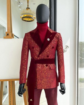 A double breasted, splash of barn red &amp; gold, dispersed tuxedo suit