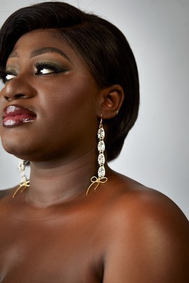 Inna Cowrie earrings