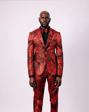 A Mahogamy red “black tears” inverted pattern peak lapel jacquard suit