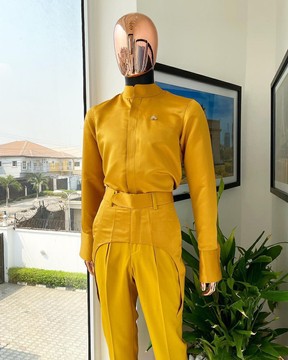 A monochrome “Made in Lagos”, Layered silk pant trousers &amp; bishop neck shirt.