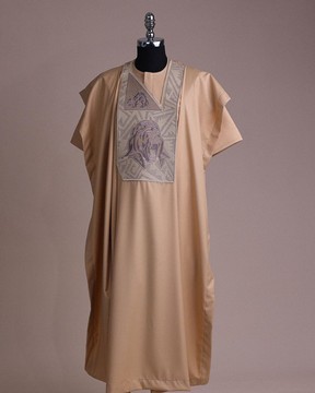 A tortilla town, roaring godzilla metallic wire embroidery details Agbada.
