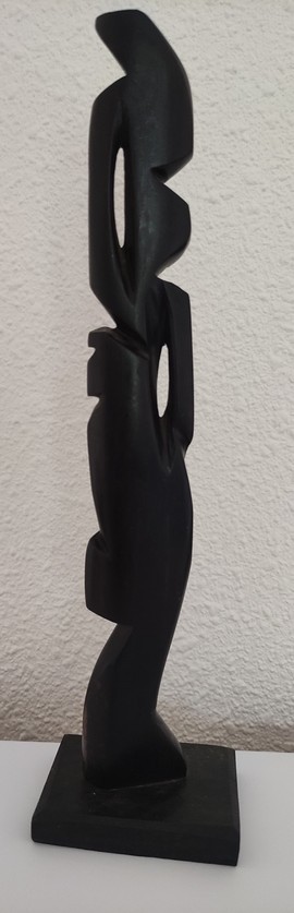 statue - sculpture in ebony wood in the shape of a woman carrying a pot on her head