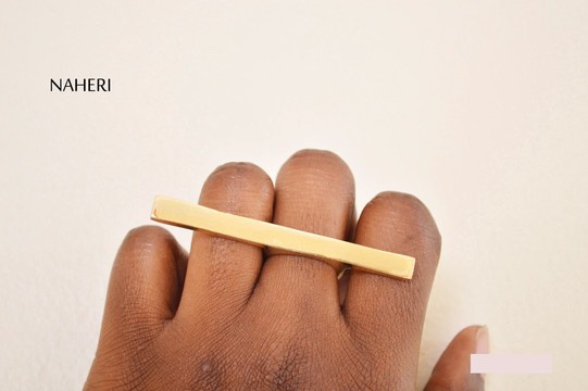 African brass ring horizontal bar