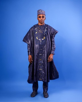 A Navy blue Malian with sizzling jacquard embroidery details, traditional Agbada