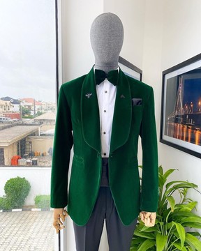 A Soaked velvet forest green tuxedo suit