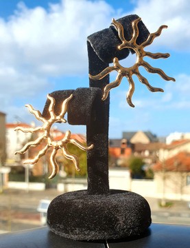 Gold color "sun" earrings