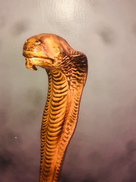 Wooden cobra snake curving