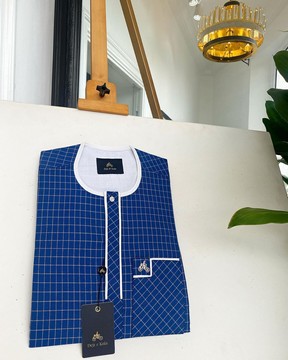 An ivory white and blue check, clear view transparent kaftan