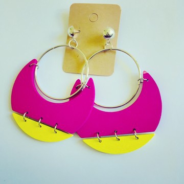 Beautiful pair of steel earrings and cowrie shells