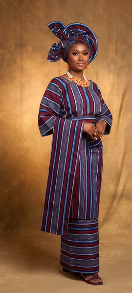 Women's handwoven Aso Oke outfit.