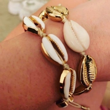 Cowrie and gold bracelet