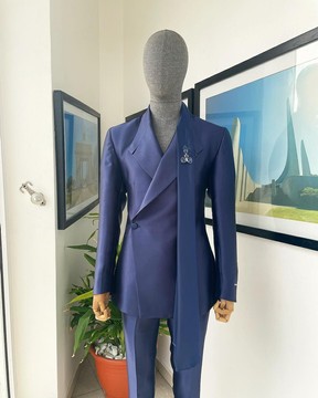 A Mikado Silk “rumble in jungle”, wrap Notch lapel, slant sache blazer suit