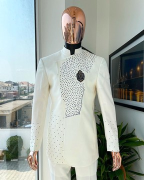 An ivory white, slide cut, navy blue dispersed and clustered Swarovski stone detailing